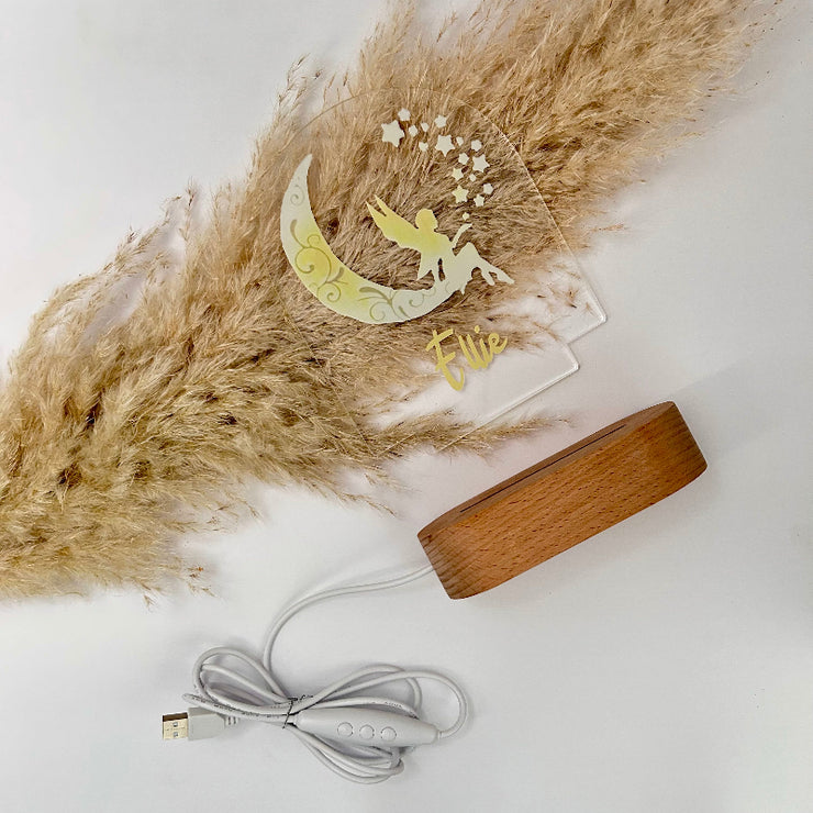 Custom name lamp with a fairy design and wooden base 