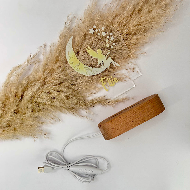 Custom name lamp with a fairy design and wooden base 